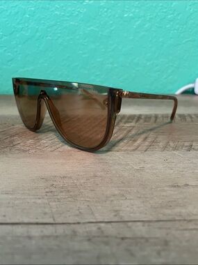 Michael Kors Unisex MK2151 Aspen Amber Rimless Shield Sunglasses